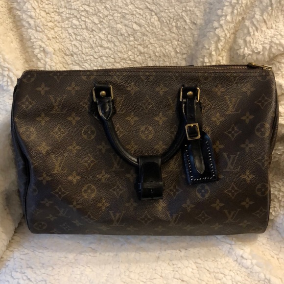 lv speedy with black handles